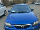 Mazda 323 2003 года