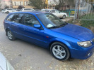 Mazda 323 2003 года