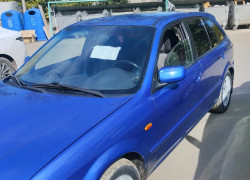 Mazda 323 2003 года