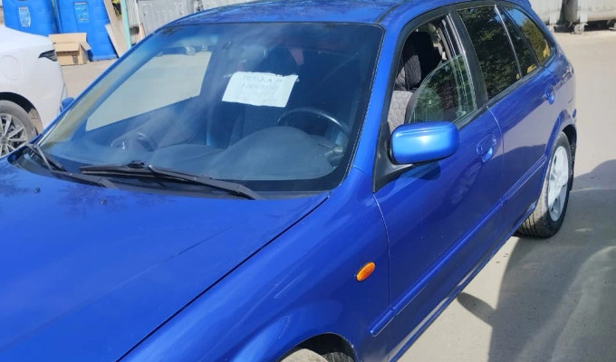 Mazda 323 2003 года