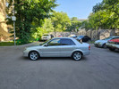 Mazda 323 2000 года