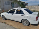Mazda 323 2003 года