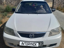 Mazda 323 2003 года