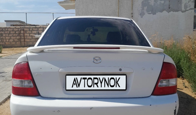 Mazda 323 2003 года