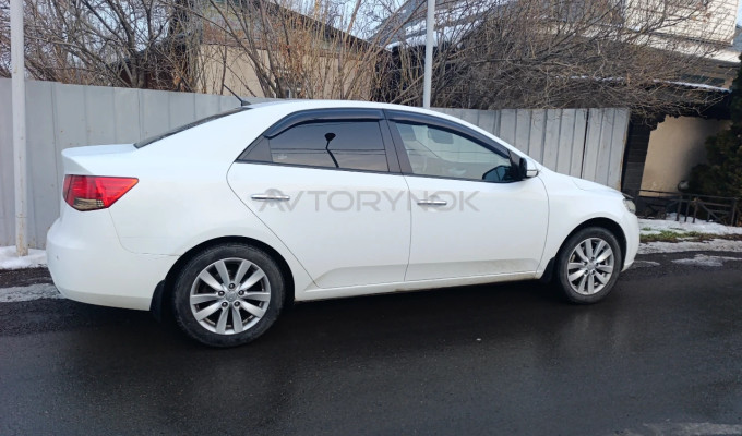 Kia Cerato 2011 года