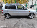 Mazda Demio 1999 года