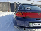 Mazda 323 1997 года