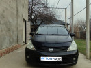 Nissan Tiida 2010 года