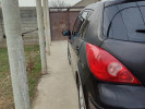 Nissan Tiida 2010 года