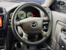 Mazda Demio 1997 года