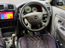 Mazda Demio 1997 года