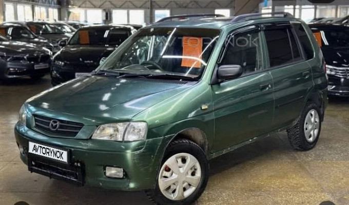 Mazda Demio 1997 года