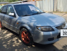 Mazda 323 2002 года
