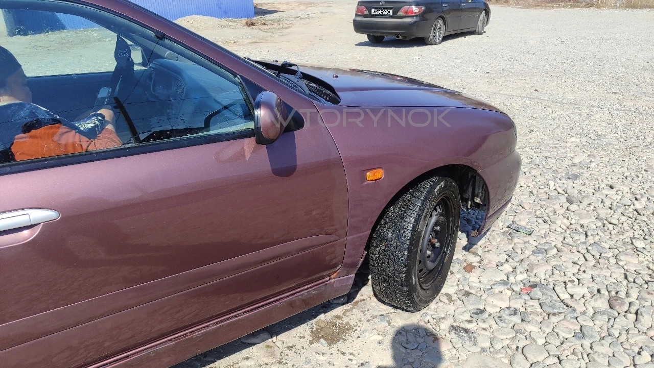 Nissan Primera, 2001