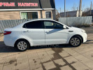 Kia Rio 2014 года