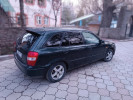 Mazda 323 1998 года