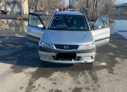 Mazda Demio 2000 года