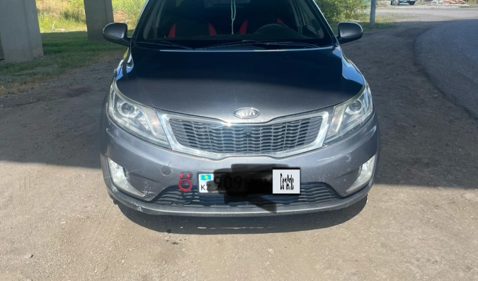 Kia Rio 2013 года