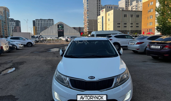 Kia Rio 2014 года