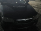 Mazda 323 2000 года