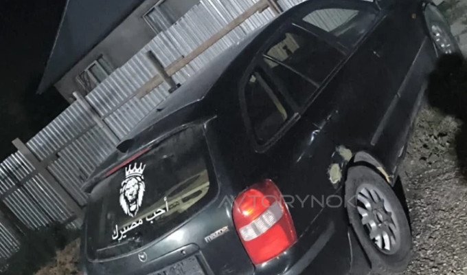 Mazda 323 2000 года