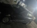 Mazda 323 2000 года