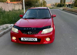 Mazda 323 1999 года