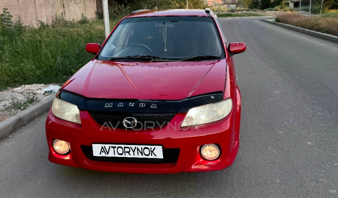 Mazda 323 1999 года