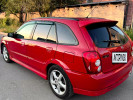 Mazda 323 1999 года