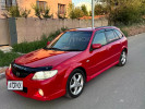 Mazda 323 1999 года