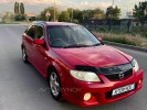 Mazda 323 1999 года