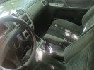 Mazda 323 1999 года