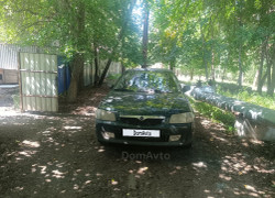 Mazda 323 1999 года