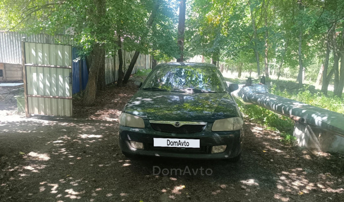 Mazda 323 1999 года