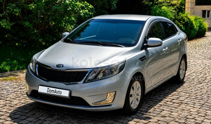 Kia Rio 2014 года