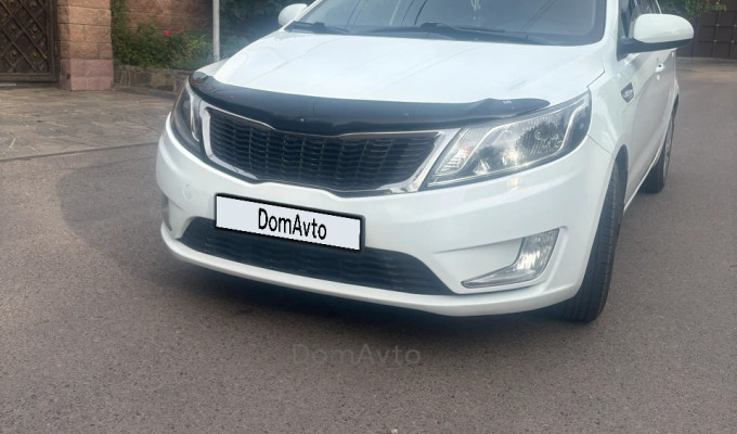 Kia Rio 2014 года