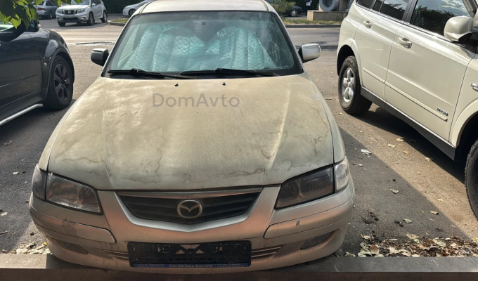 Mazda 626 1999 года