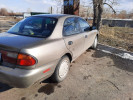Mazda 323 1998 года