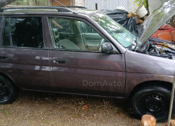 Mazda Demio 1999 года