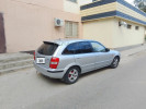Mazda 323 1999 года