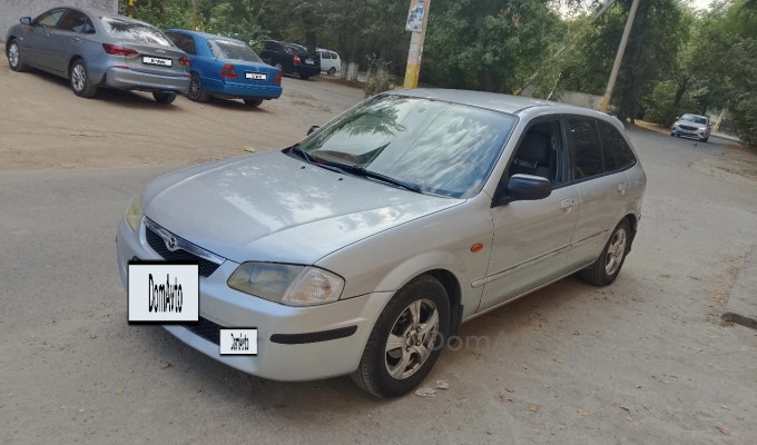 Mazda 323 1999 года