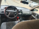 Mazda 323 1999 года