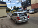 Mazda 323 1999 года