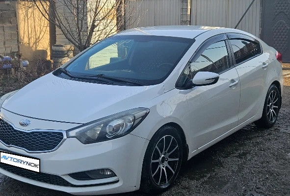 Kia Cerato 2013 года