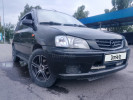 Mazda Demio 2002 года