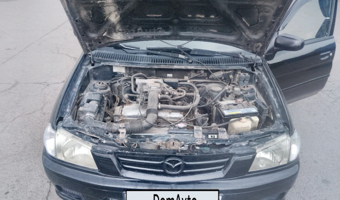 Mazda Demio 2002 года