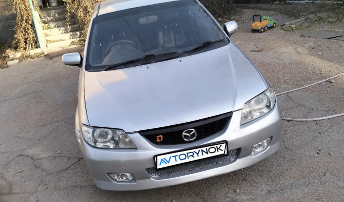 Mazda 323 2003 года