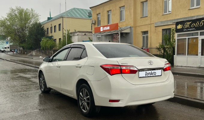 Toyota Corolla 2013 года