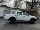 Mitsubishi L200 2012 года