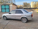 Mazda 323 2003 года